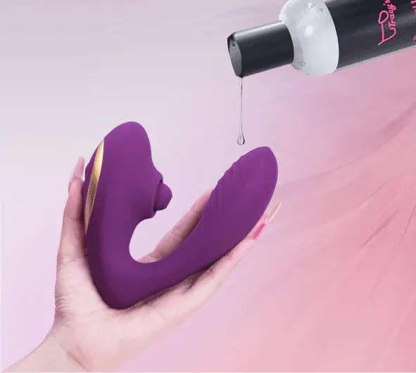 Purple OG POP clitoral tapping vibrator with black charging nozzle and lubricant drop