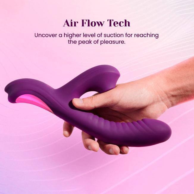 Purple silicone rabbit vibrator with Air Flow Tech suction design in hand