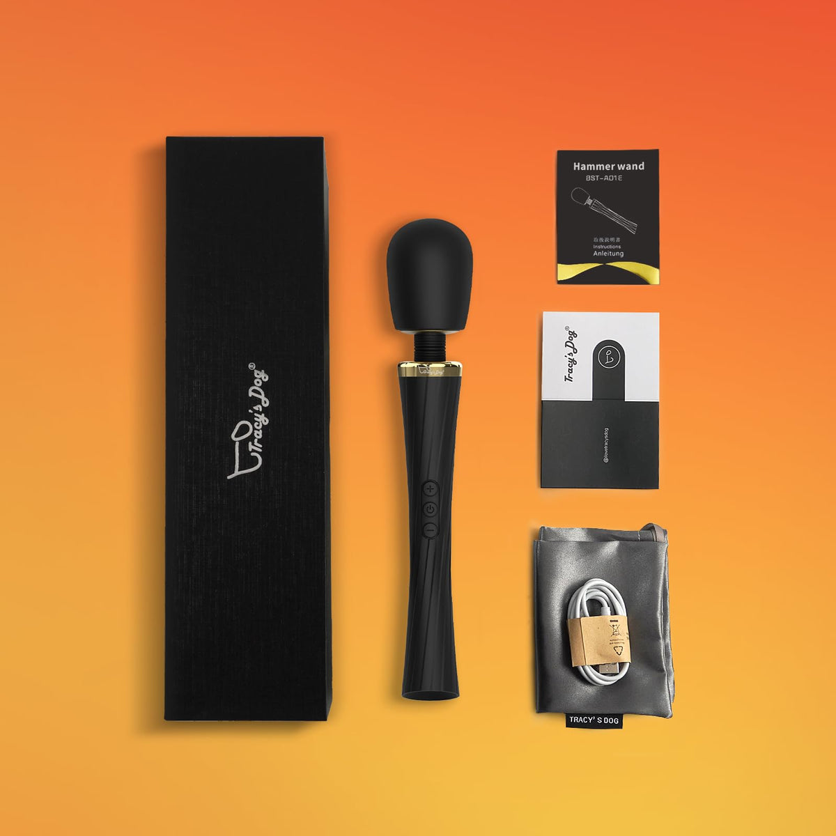 Black magic vibrating wand massager with charging cable, manual, and storage pouch