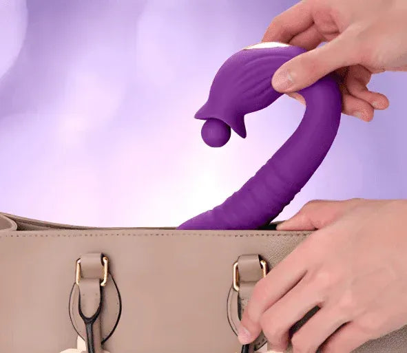 Purple silicone clitoral licking vibrator with curved textured handle and spinning flower head in bag