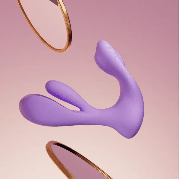 Purple wearable swing vibrator with curved dual-stimulation design on pink background