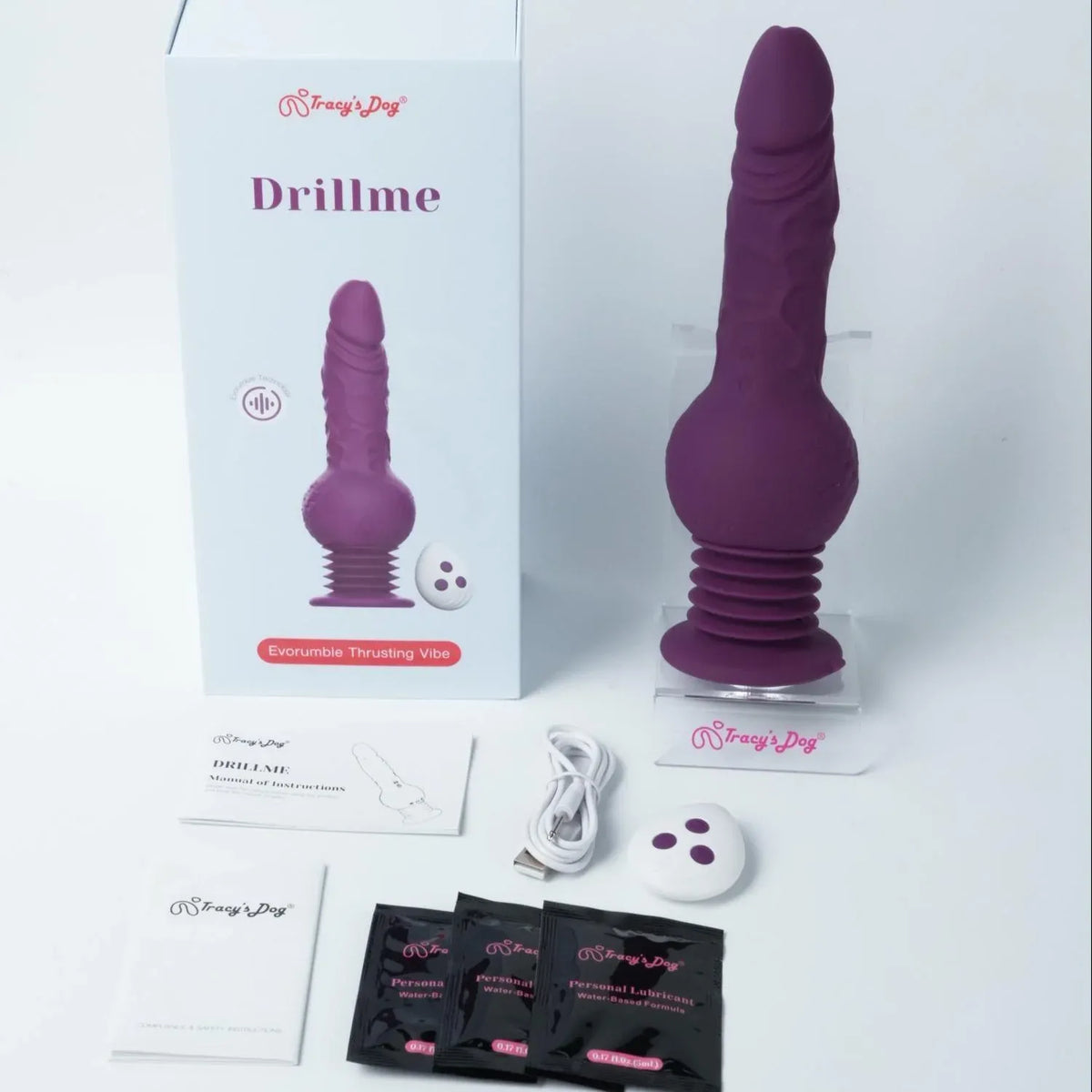 Purple Drillme thrusting dildo vibrator with box, remote, cable, manual, and lubricant packets