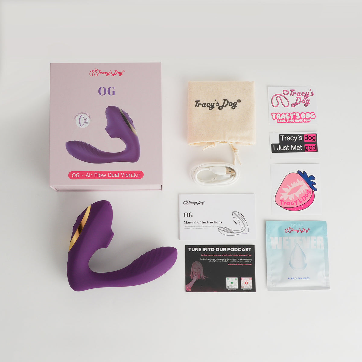 Purple OG air flow dual vibrator with charging cable, manual, pouch, stickers and wipes