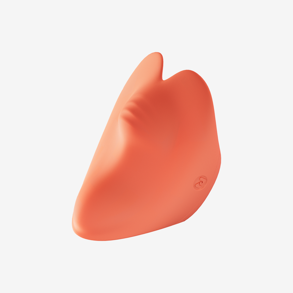 Coral silicone Pockety wearable mini vibrator with ergonomic dual-stimulation design