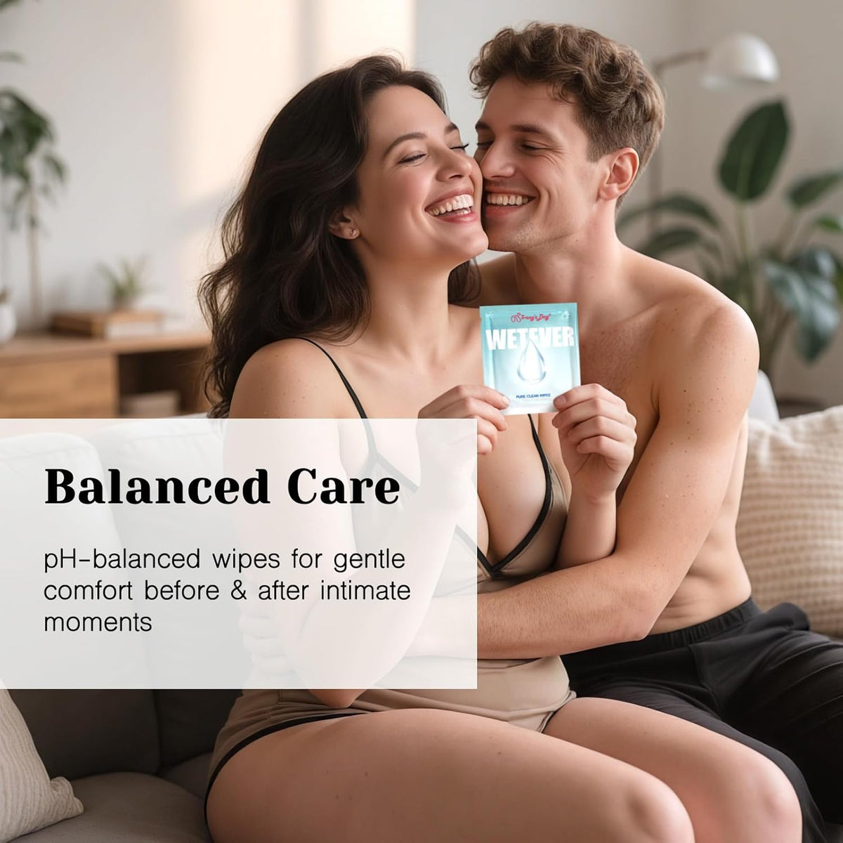 Couple holding Tracy's Dog Pure Clean Wipes pack, Balanced Care pH-balanced intimate wipes