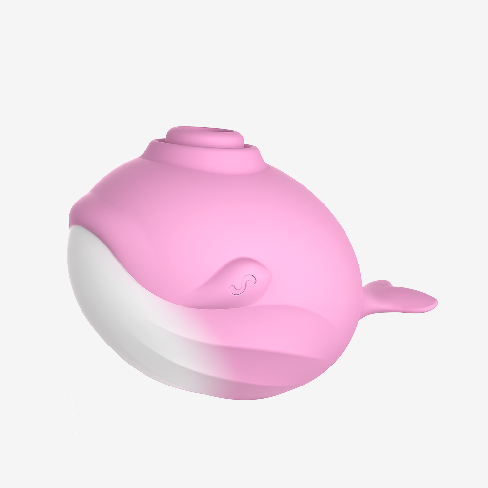 Pink whale-shaped clitoral sucker with smooth silicone body and white base