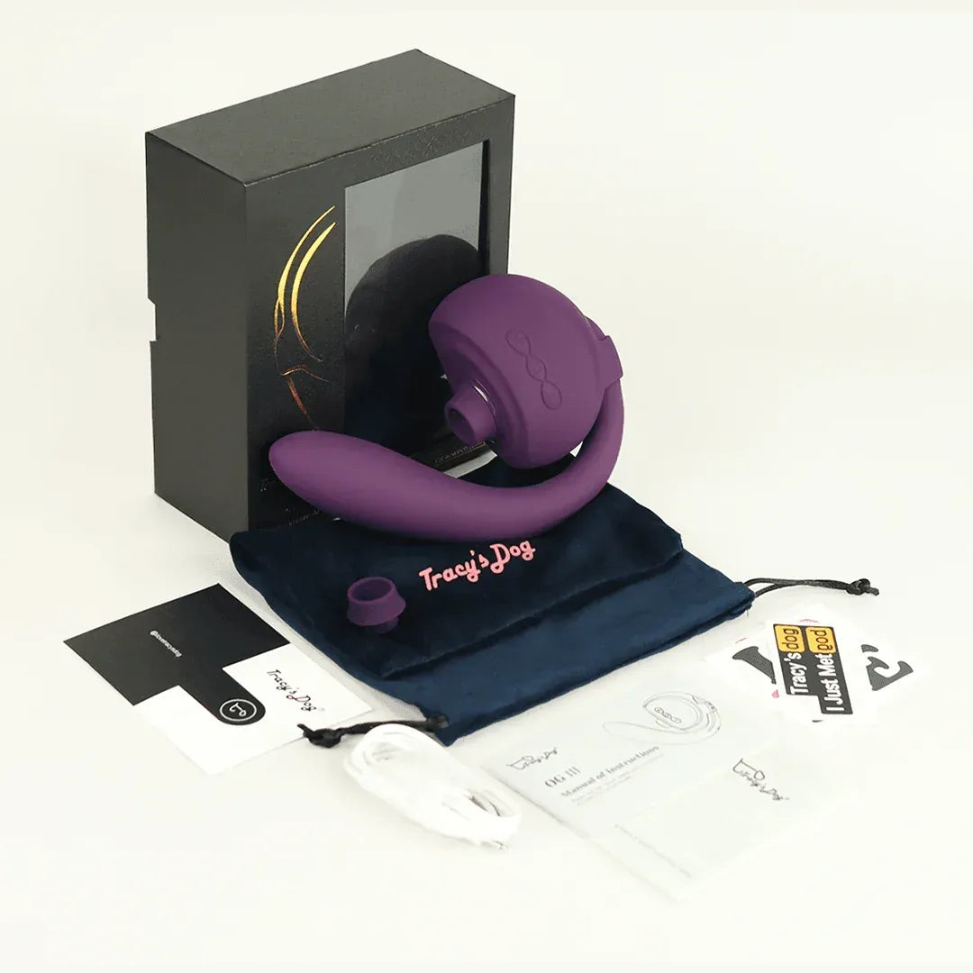 Purple OG 3 clitoral sucking vibrator with black box, pouch, manuals, and accessories