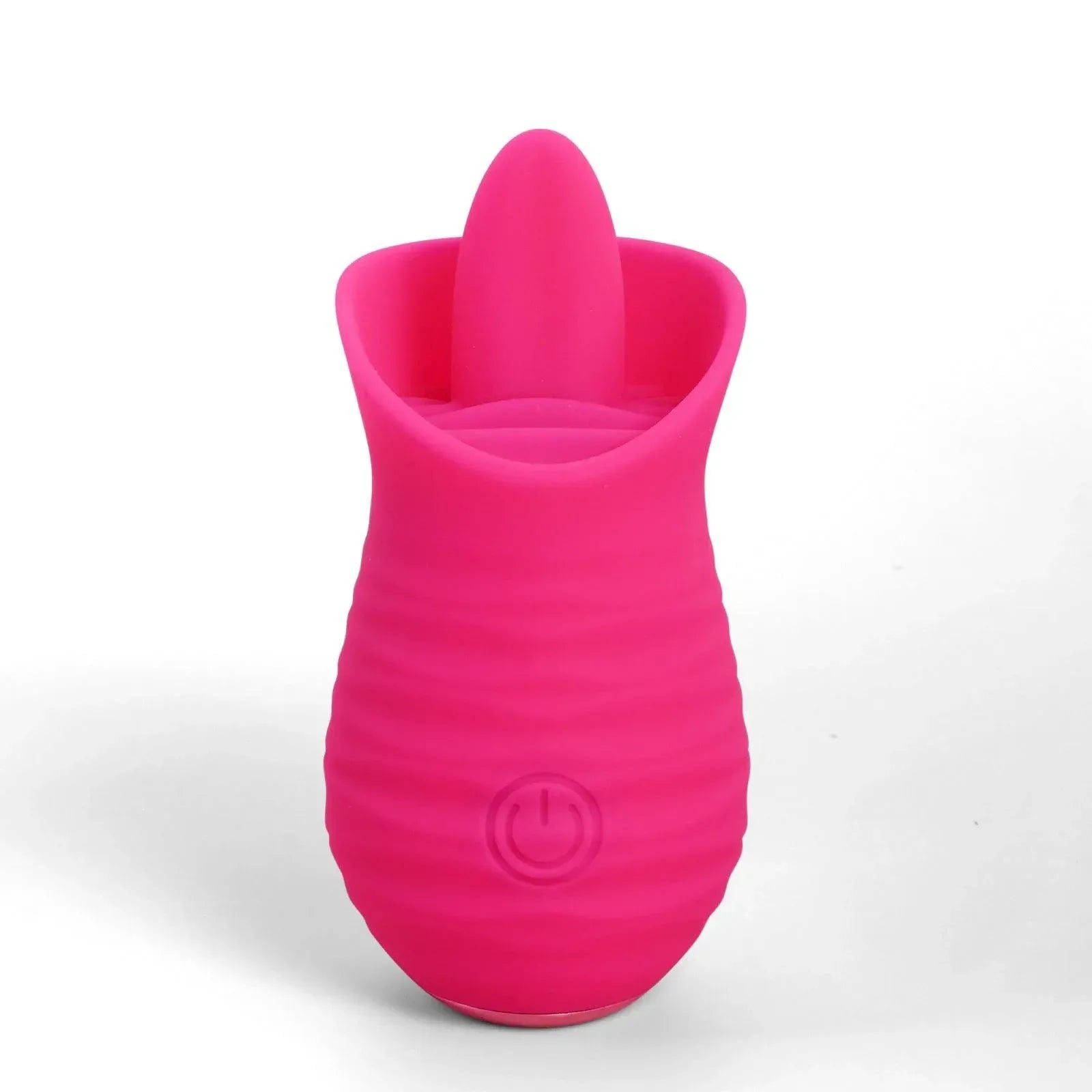Bright pink silicone vibrator shaped like a tongue with ridged texture and power button. Product appearance showcase.