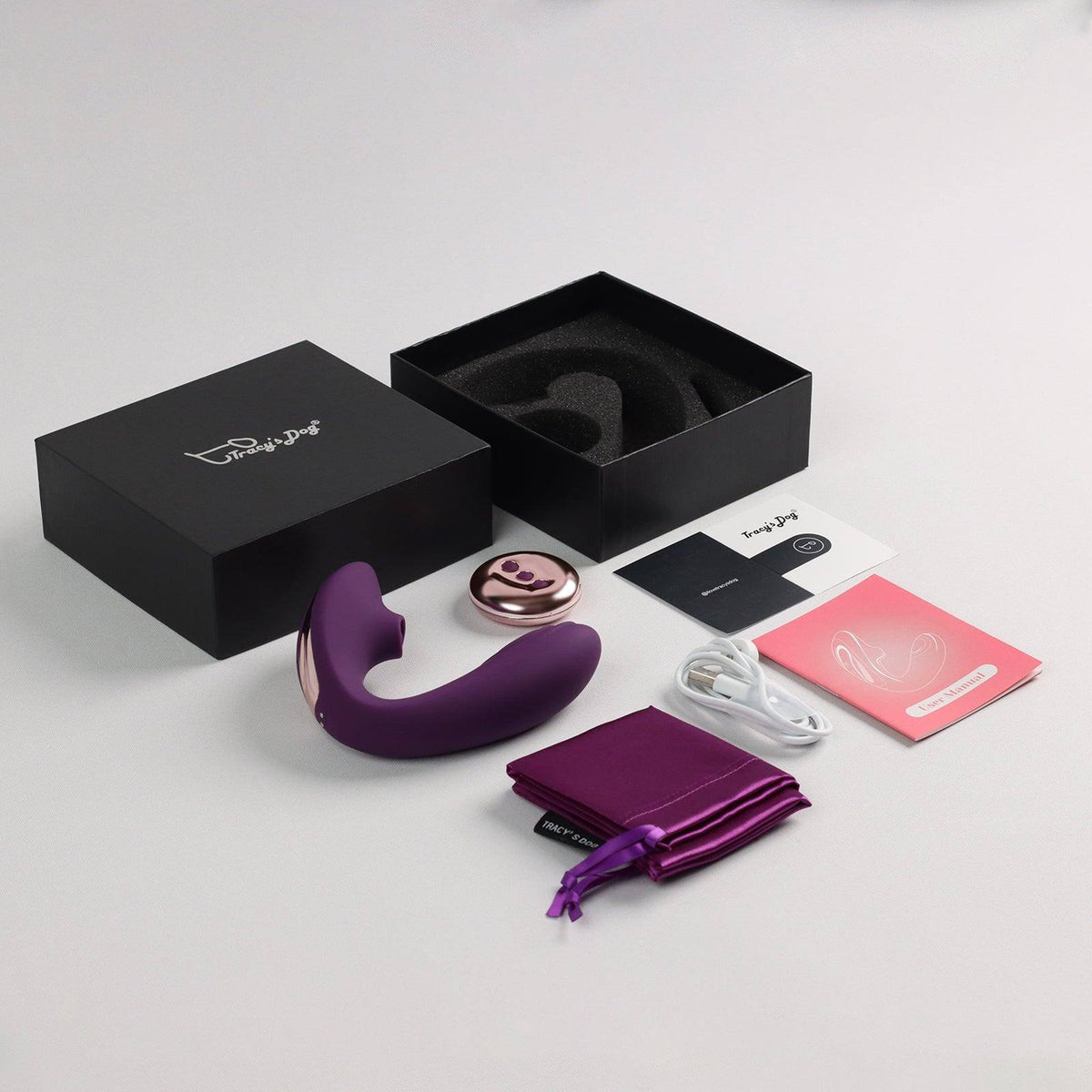 Purple Juicy clitoral licking vibrator set with magnetic charger, pouch, manual, and gift box