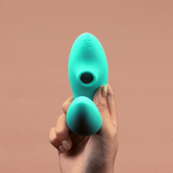 Teal OG 2 clitoral sucking vibrator held in hand, dual-stimulation design